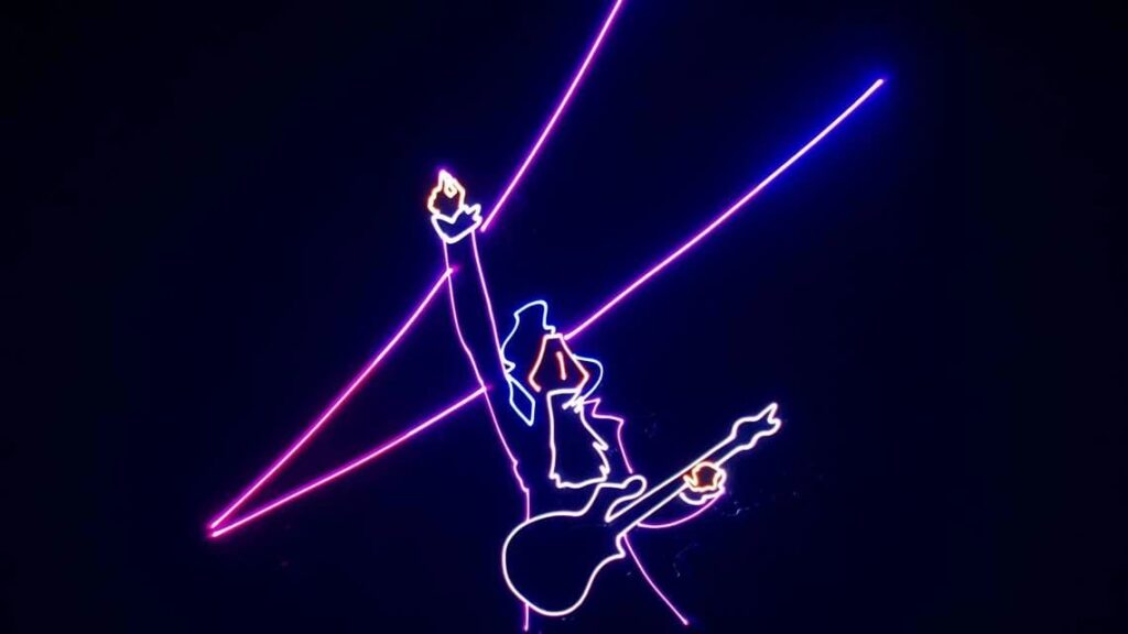Neon lights in the shape of Prince playing guitar.