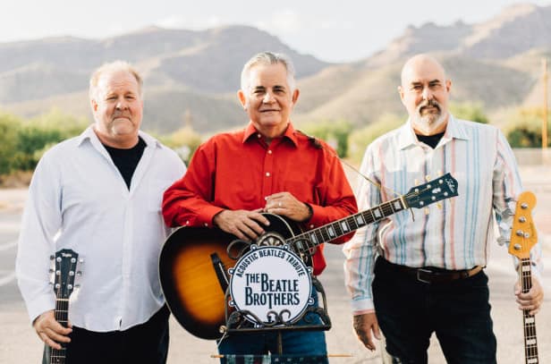 "The Beatle Brothers" 3 men standing in front of mountains